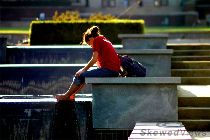 Relaxing by the Fountain