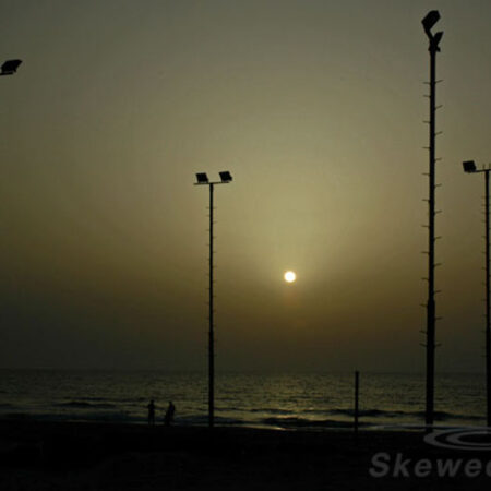 Lights on the beach by the Mediterranean