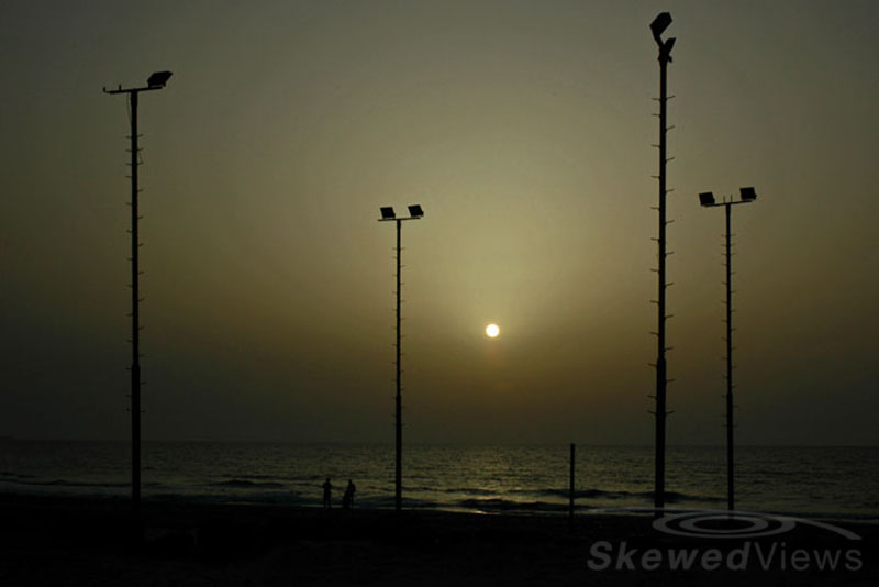 Lights on the beach by the Mediterranean