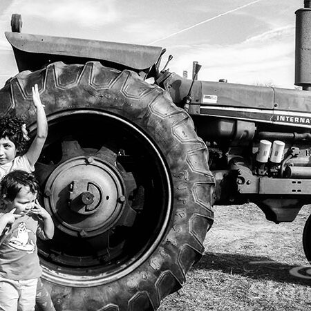 by the tractor